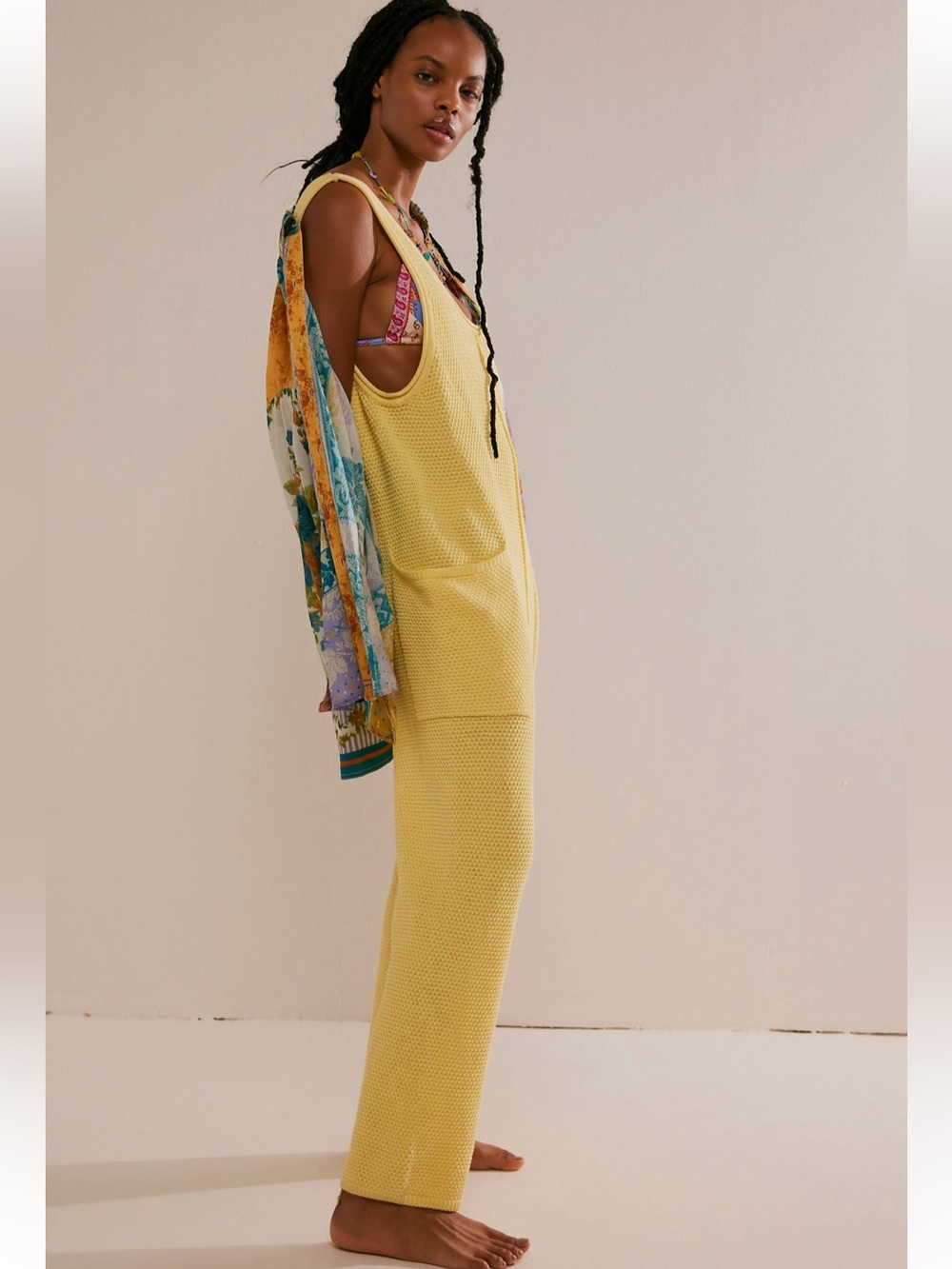 Sleeveless Pale Yellow Textured Knit Women's Jumpsuit with Front Pockets